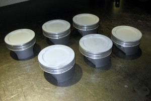 Coated GT2 pistons